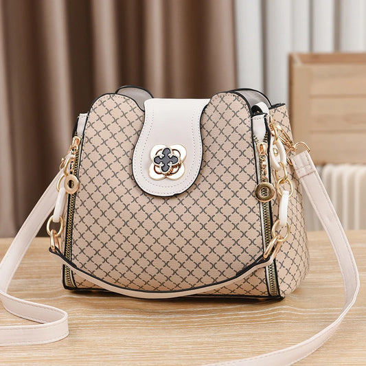 “Luxury bucket handbag for women, check print, spacious design, crossbody style.”