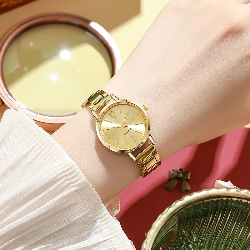 “2pcs Set Luxury Women’s Watch - Simple Dial, Hollow Strap, Gold Bracelet Quartz Wristwatch.”