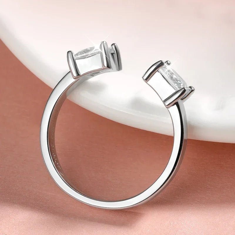 “1CTTW 4.5mm Princess-Cut Moissanite Ring, Adjustable Sterling Silver Wedding Band.”