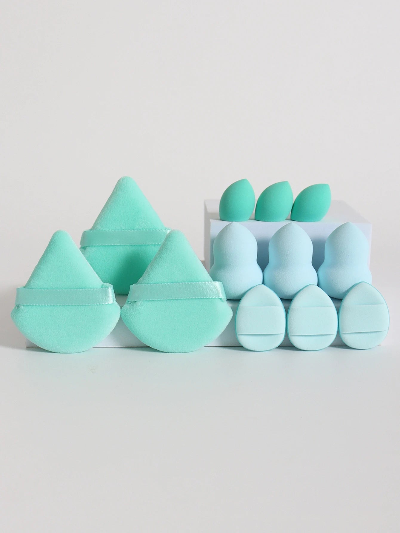 “12-piece makeup sponge set: powder puffs, air cushion puffs, and beauty eggs.”