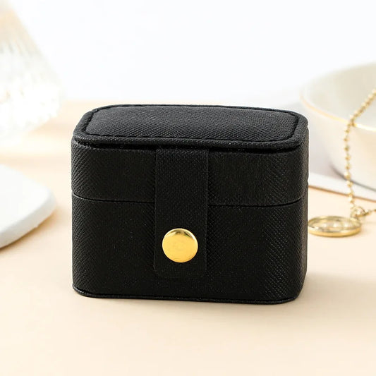 “Mini Portable Jewelry Storage Bag Leather Travel Box for Rings, Necklaces, Earrings.”