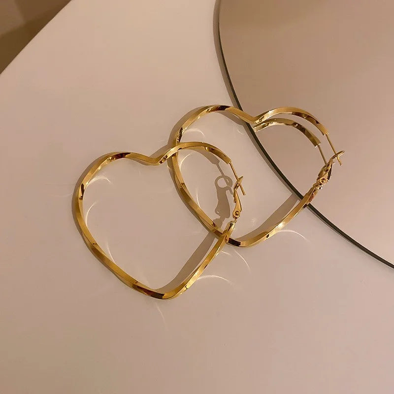 “Simple heart drop earrings, gold or silver, perfect wedding or gift jewelry.”