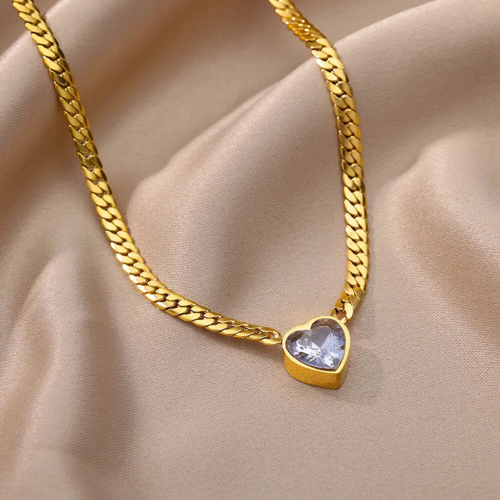 “Stainless Steel Heart-Shaped Green & White Crystal Pendant Necklace & Bracelet Set.”