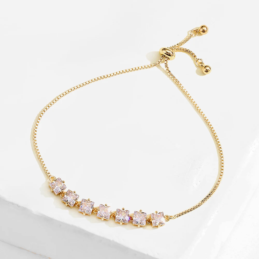 “Trendy Gold-Color Interlocked Circle Bangle, Unisex, Stylish Party Bracelet Accessory.”