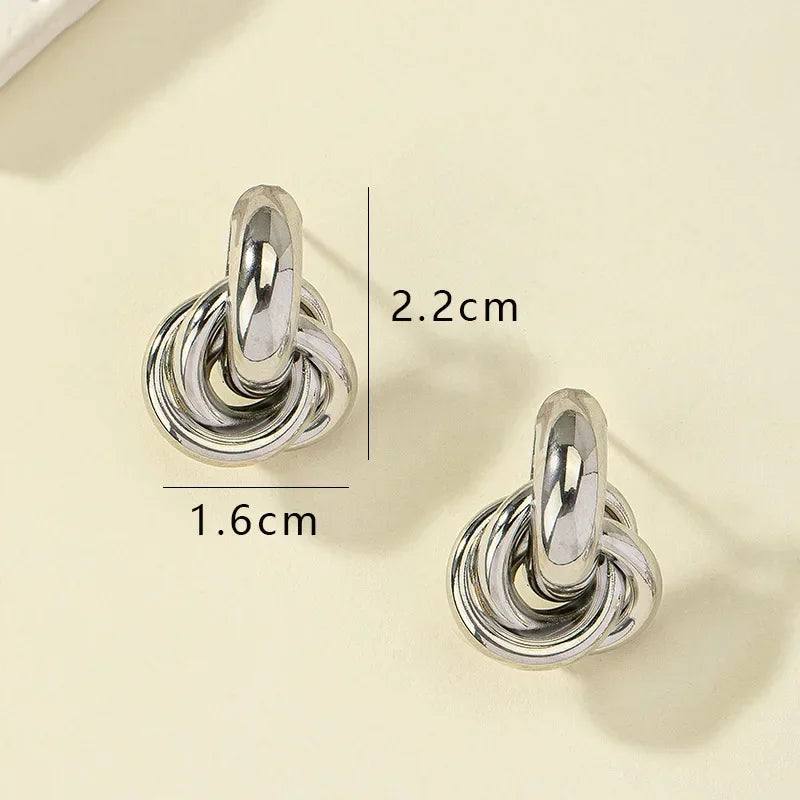 “Gold & Silver Knot Hoop Earrings – Trendy Twist Design, Shiny Plating for Daily Wear”