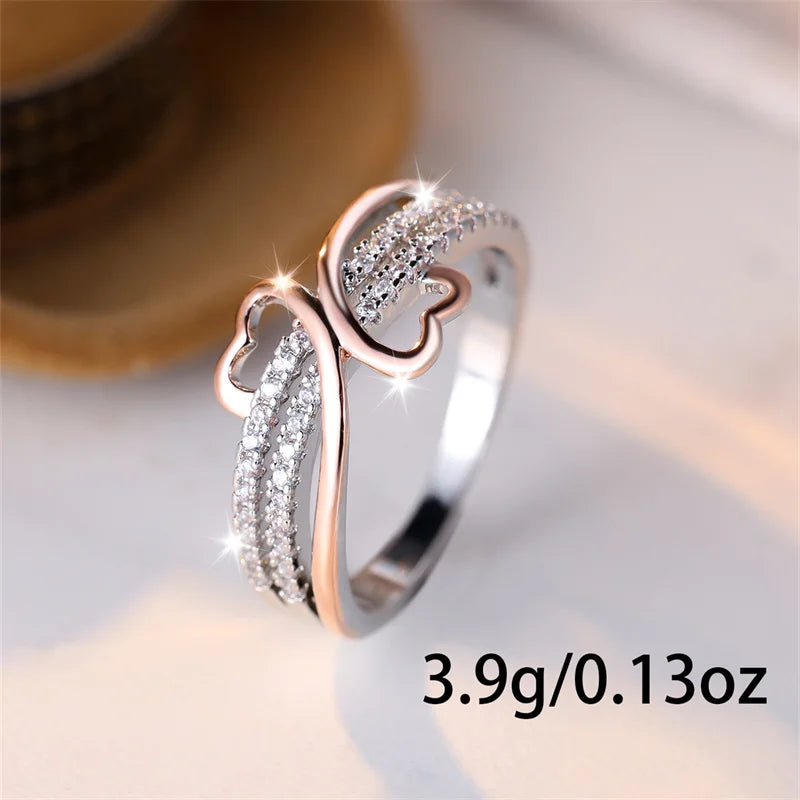 “Two-tone double heart ring, rose gold and silver, white zircon, perfect bridal jewelry.”