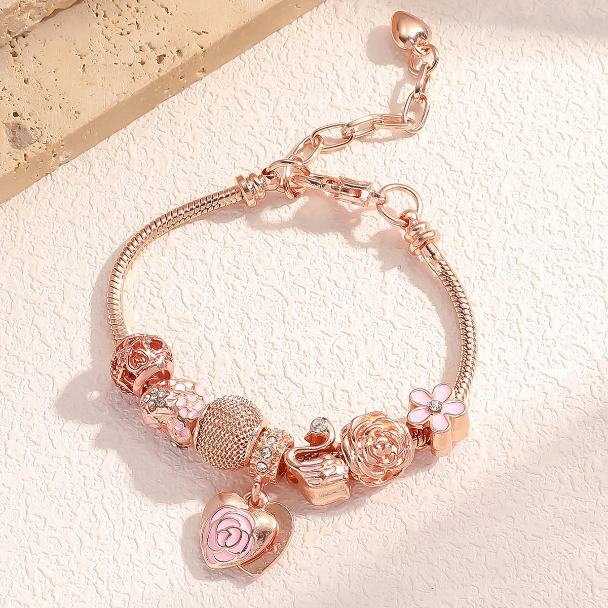 “Fashion rose and swan charm bracelet, elegant accessory for parties or daily wear.”