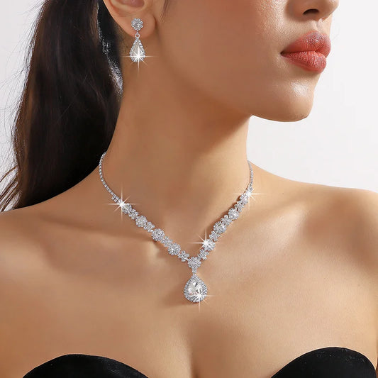 “3-piece claw chain geometric droplet earrings and necklace set, elegant wedding party gift.”