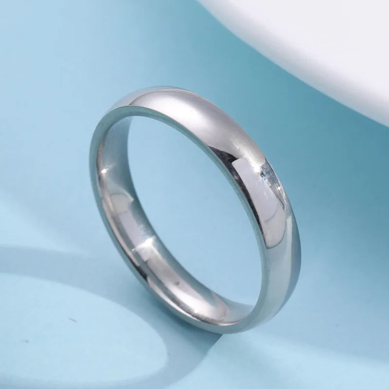 “Simple Stainless Steel Rings - Classic Couple Bands for Weddings & Engagements.”