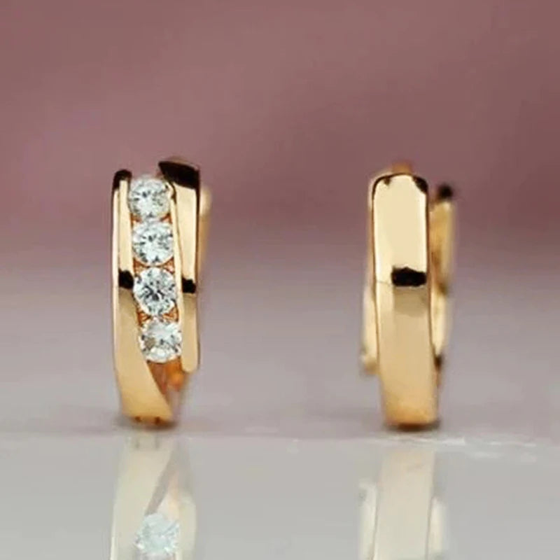 “Gold hoop earrings for women, daily wear, elegant, versatile statement jewelry.”