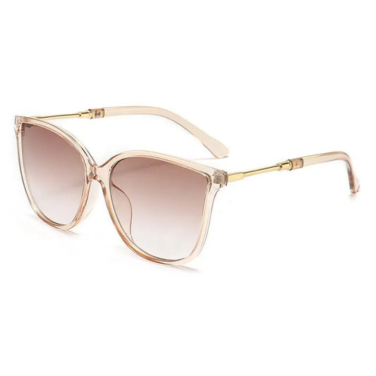 “Vintage cat-eye sunglasses, designer retro style, fashionable driving shades for women.” - Dazzory