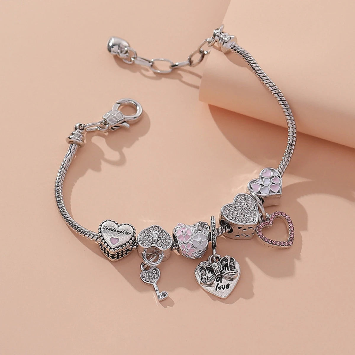 “Fashion rose and swan charm bracelet, elegant accessory for parties or daily wear.”