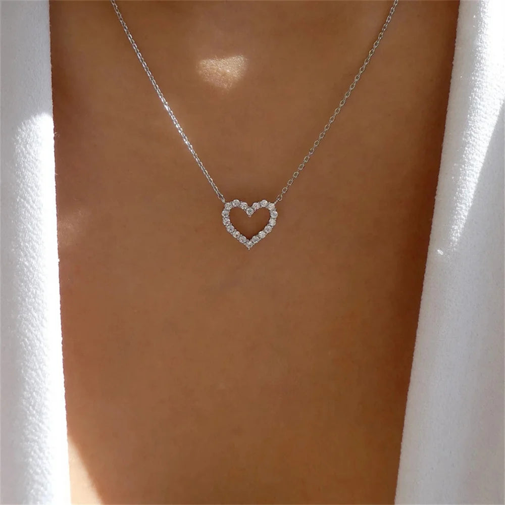 “Crystal hollow love pendant necklace, romantic zircon, simple trendy jewelry for women.”
