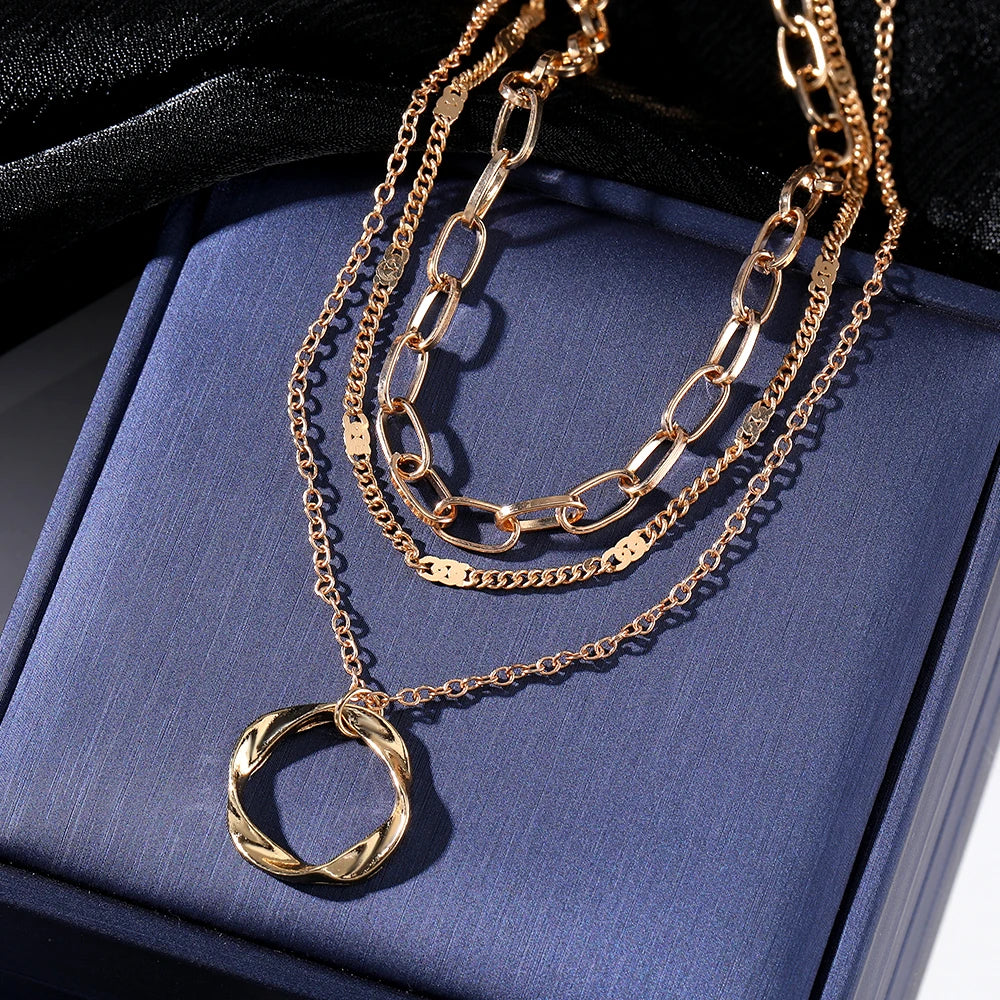 “IPARAM Gold Multi-Layered Chain Necklace – Vintage Circle Pendant, Fashion Jewelry for Women & Girls”