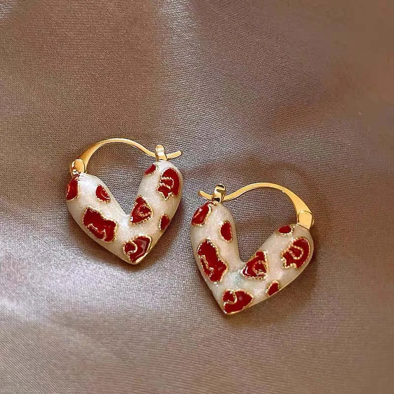 “Trendy red dripping oil heart hoop earrings for women, elegant Korean-style love dangle earrings, perfect as a gift.”