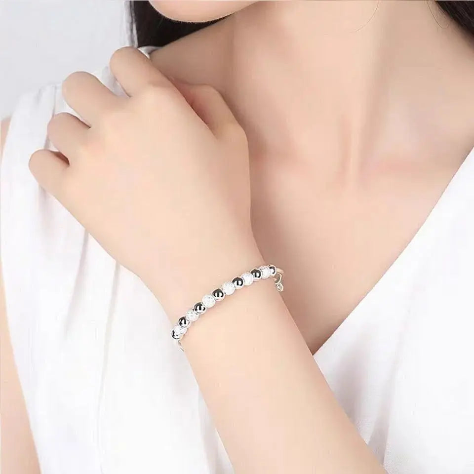 “925 Silver-Color Luxury Charms Beads Bracelet - Adjustable Fashion Jewelry for Women.”