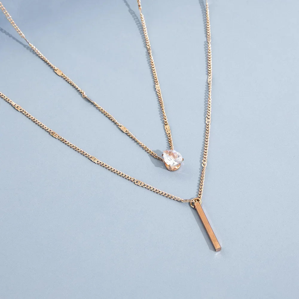 “Fashion Multi-Layer Necklace for Women - Crystal Water Drop Pendant, Gold/Silver Color Choker.”