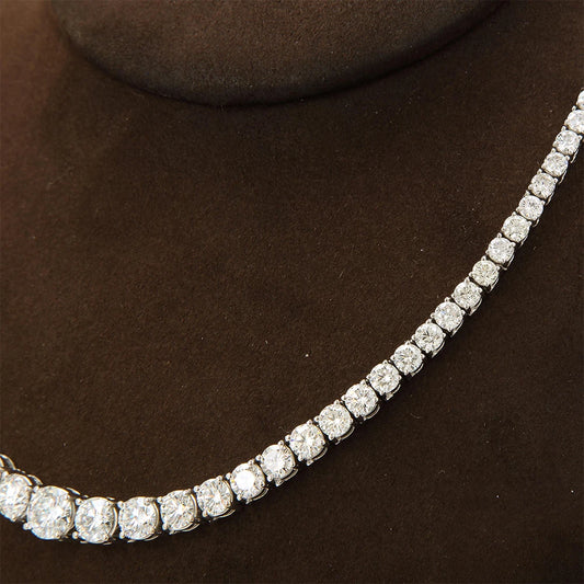 “Moissanite tennis necklace, 3-5mm gradient stones, 925 silver, certified luxury design.”