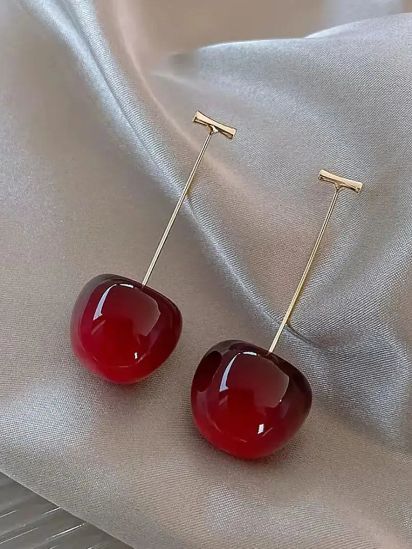 “Red cherry dangle earrings, fruit design, statement jewelry, perfect for parties.”