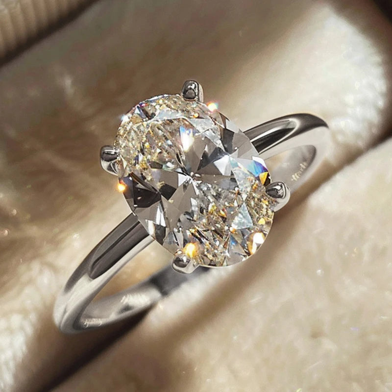 “925 sterling silver oval zircon ring, shiny and luxurious for weddings and engagement.” - Dazzory