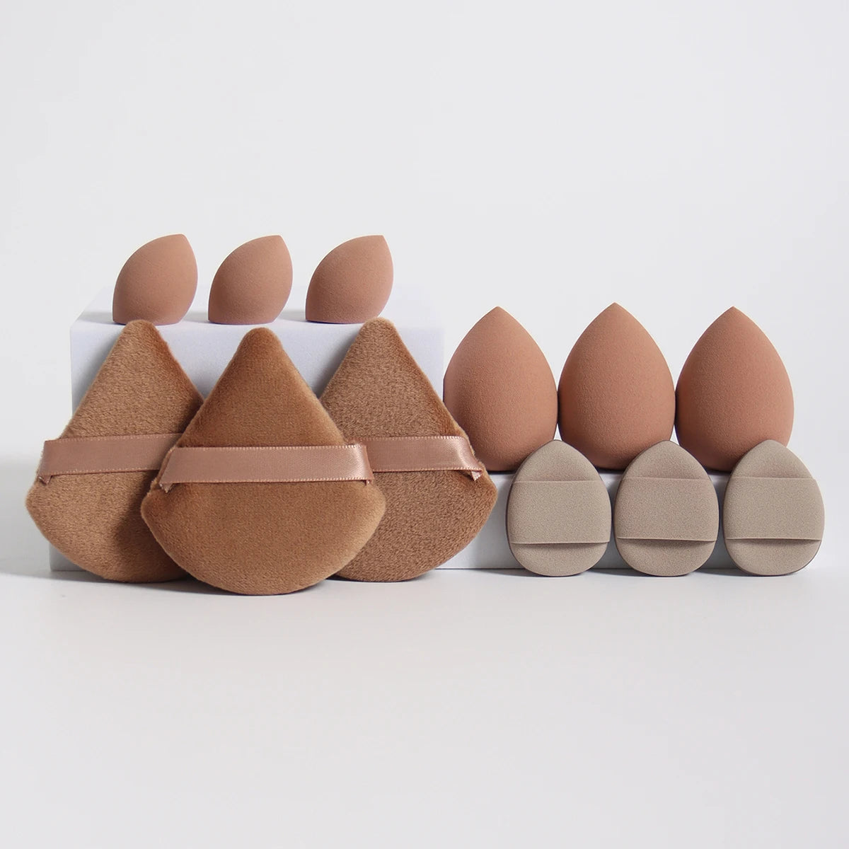 “12-piece makeup sponge set: powder puffs, air cushion puffs, and beauty eggs.”
