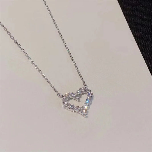 “Crystal hollow love pendant necklace, romantic zircon, simple trendy jewelry for women.”