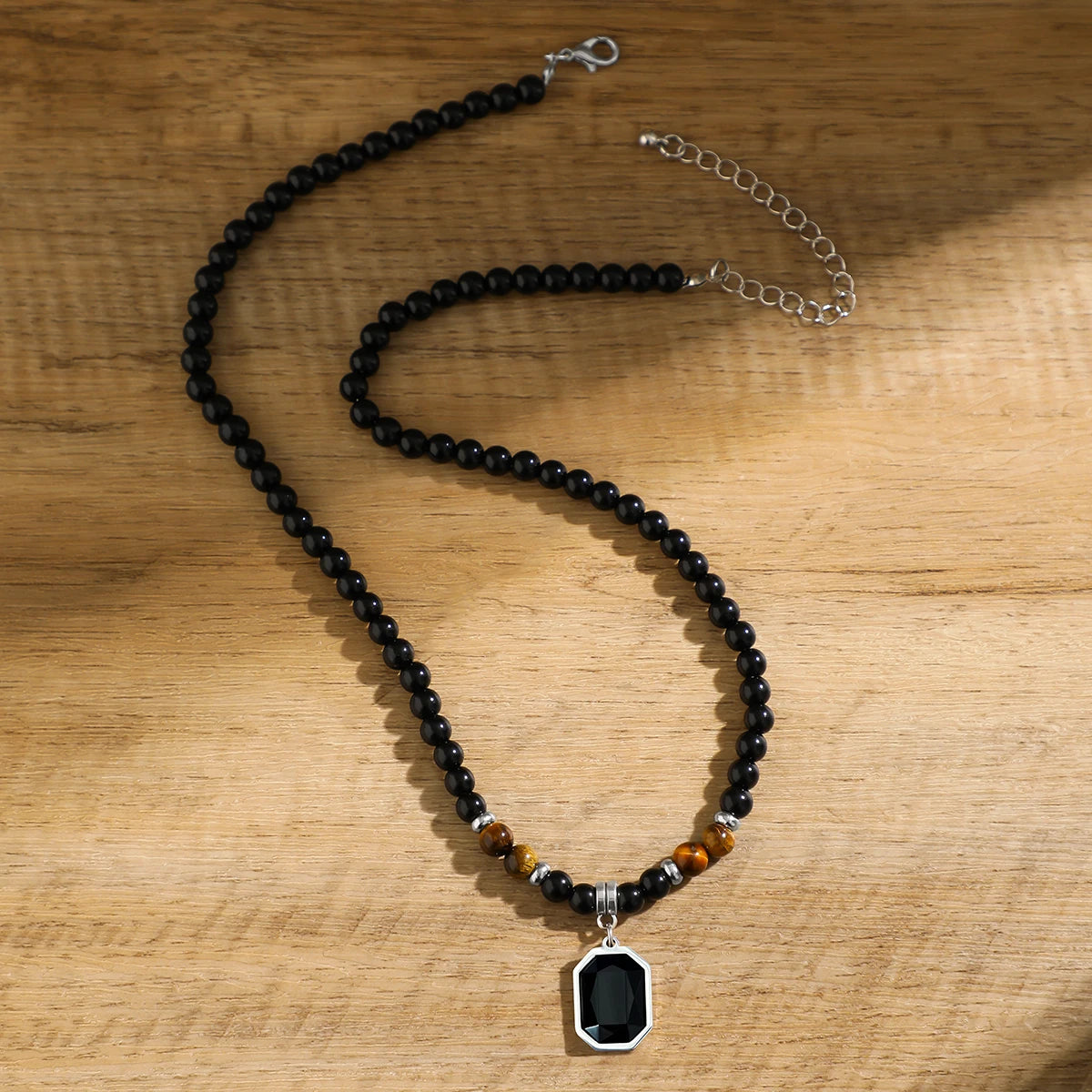 “Black Beads with Square Pendant Necklace for Men - Trendy Fashion Jewelry.”
