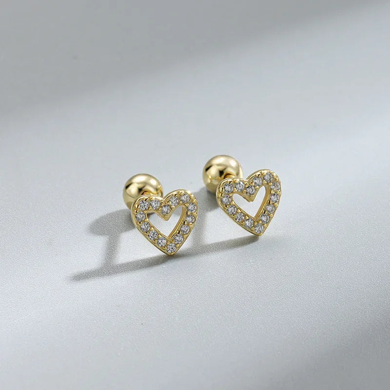 “Fashion heart stud earrings, hypoallergenic, perfect for cartilage piercings and gifts.”