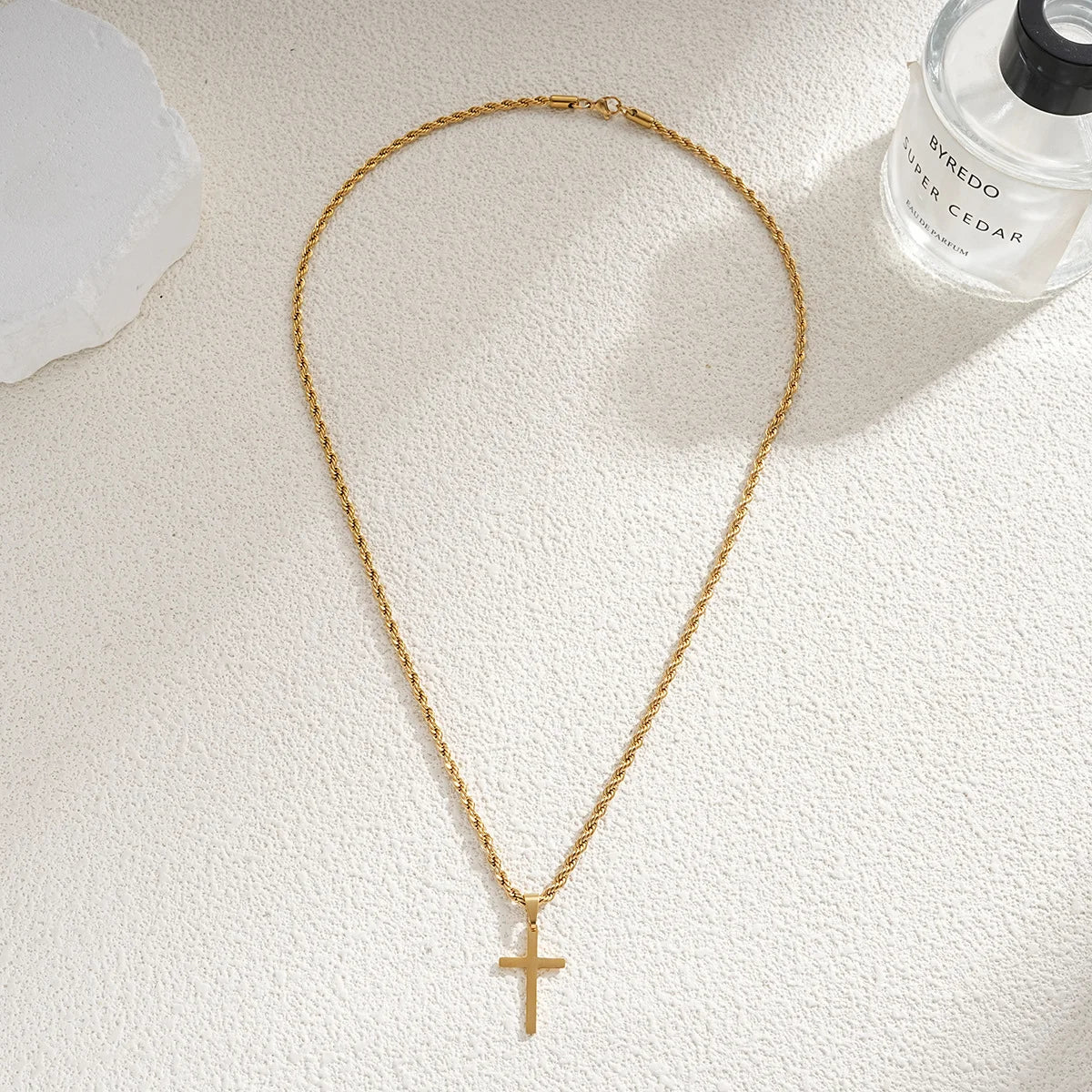 “Stainless Steel Cross Pendant Necklace for Men & Women - Gold Minimalist Jewelry.”