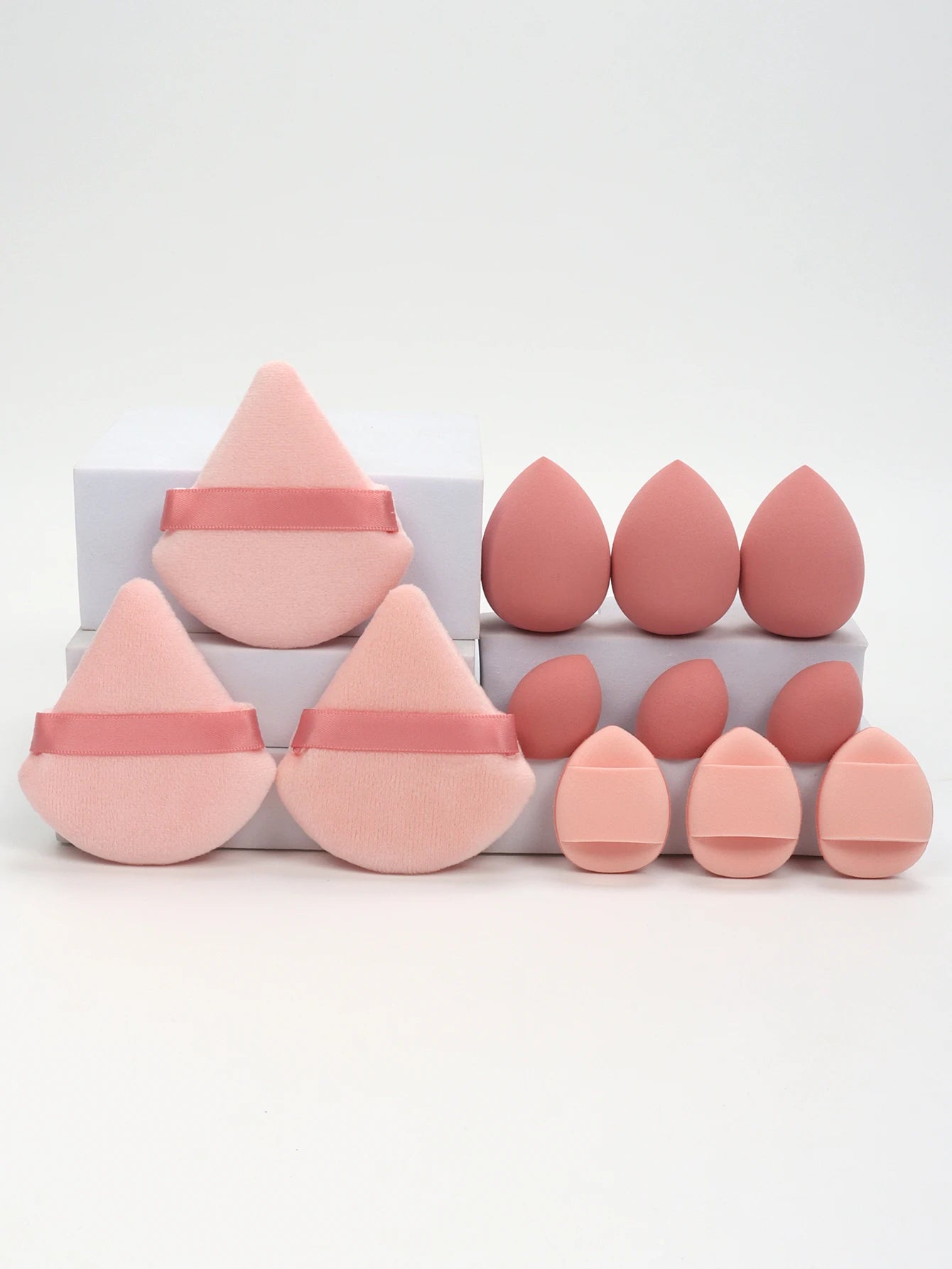 “12-piece makeup sponge set: powder puffs, air cushion puffs, and beauty eggs.”
