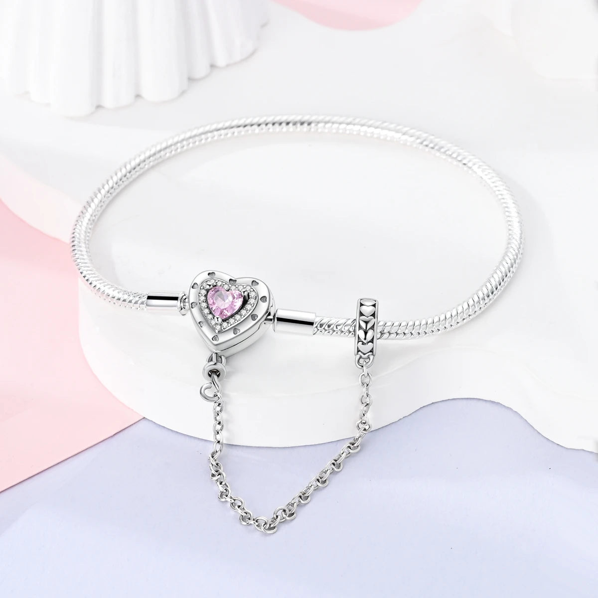 “Silver plated charm bracelet with safety chain, snake chain fits beads, perfect gift.”