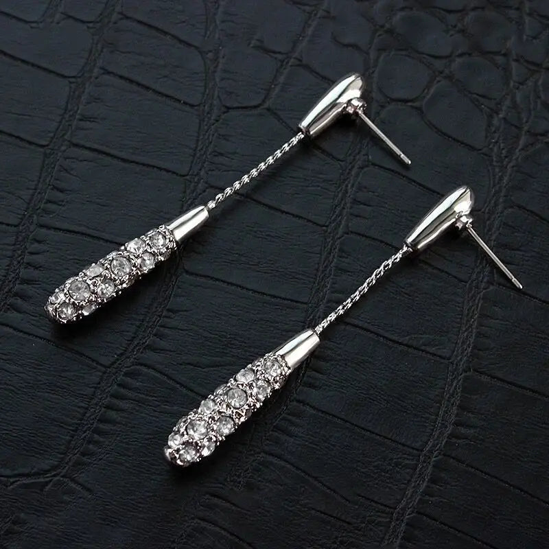 “Korean Tassel Pearl Drop Earrings - Luxury Gold Wedding Jewelry.”