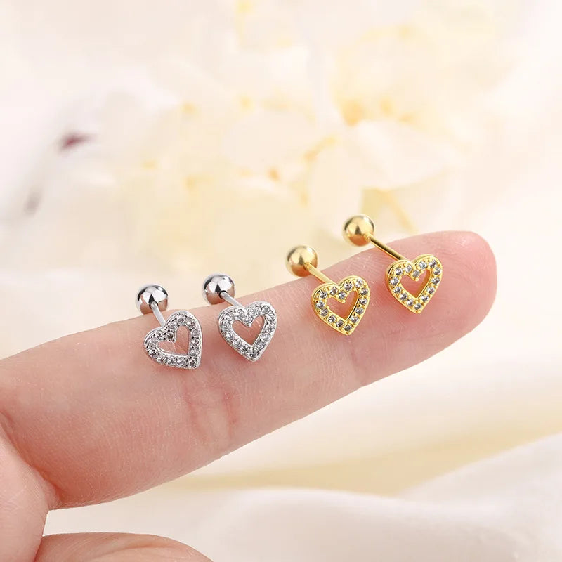 “Fashion heart stud earrings, hypoallergenic, perfect for cartilage piercings and gifts.”