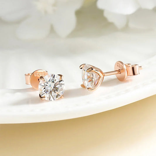 “Rose gold moissanite stud earrings, 0.2-3CT, 925 silver, perfect for weddings.”