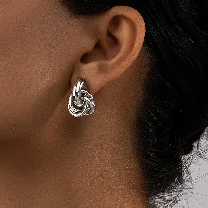 “Gold & Silver Knot Hoop Earrings – Trendy Twist Design, Shiny Plating for Daily Wear”