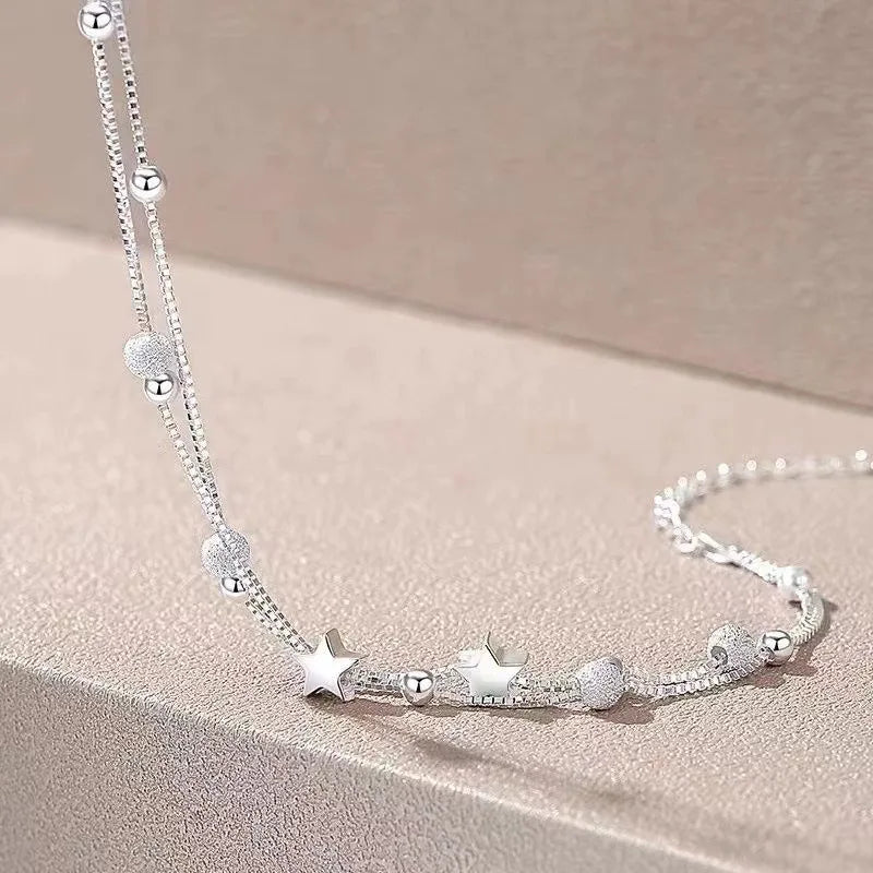 “Luxury 925 sterling silver star beaded double-layer adjustable bracelet for women.”