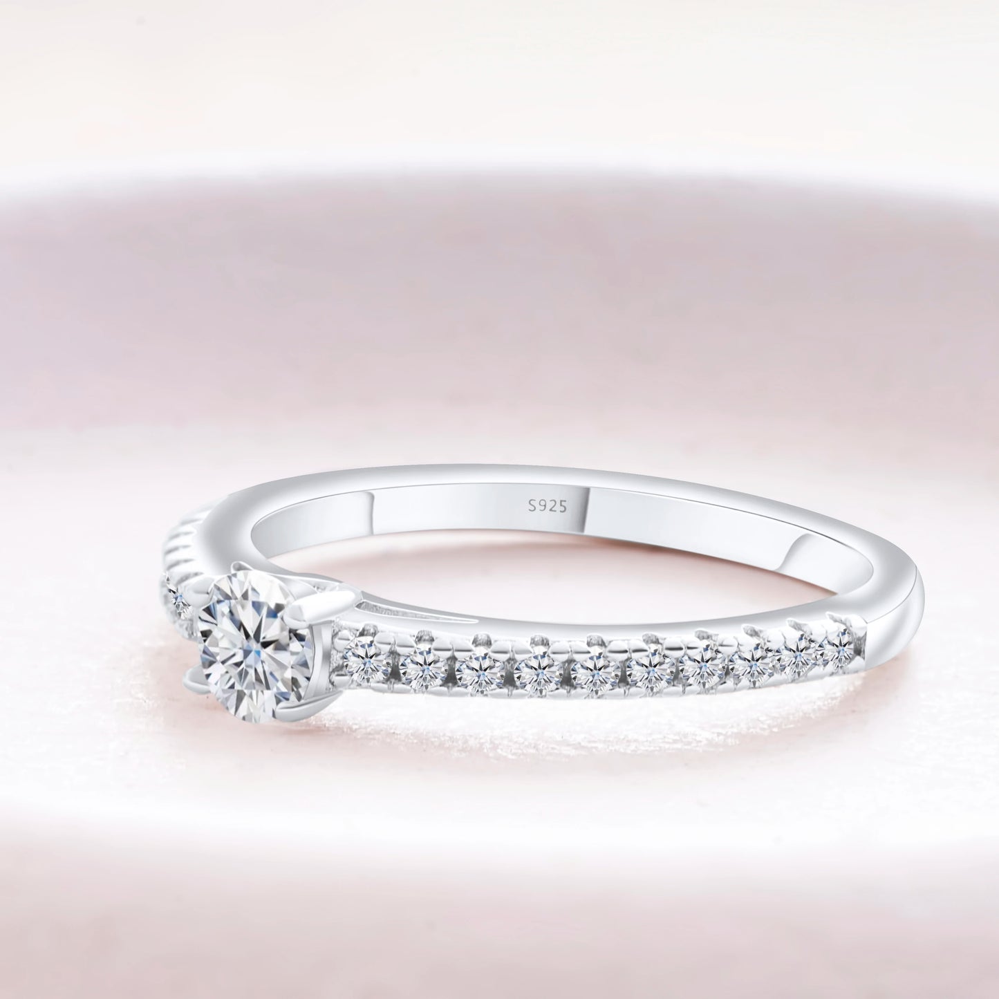 “925 sterling silver ring with 0.3CT moissanite, simple and sparkling design.”
