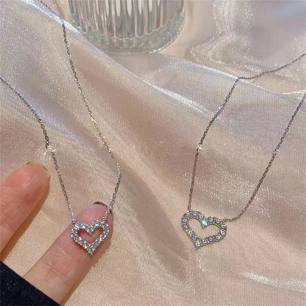 “Crystal hollow love pendant necklace, romantic zircon, simple trendy jewelry for women.”