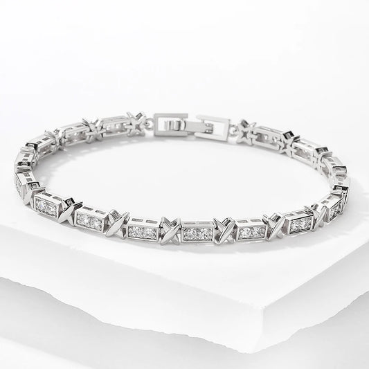“Elegant X Cross Zirconia Charm Bracelet for Women and Men, Luxury Wedding Party Jewelry.”