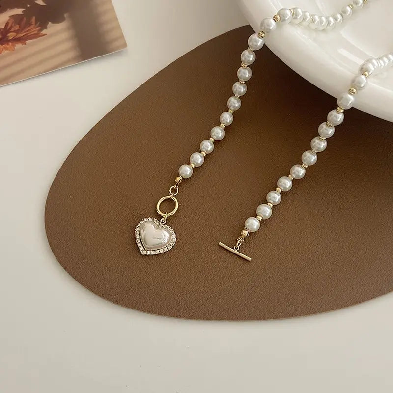 “Elegant Pearl Necklace for Women - Heart Pendant, Luxury Imitation Pearls, Korean Jewelry.”