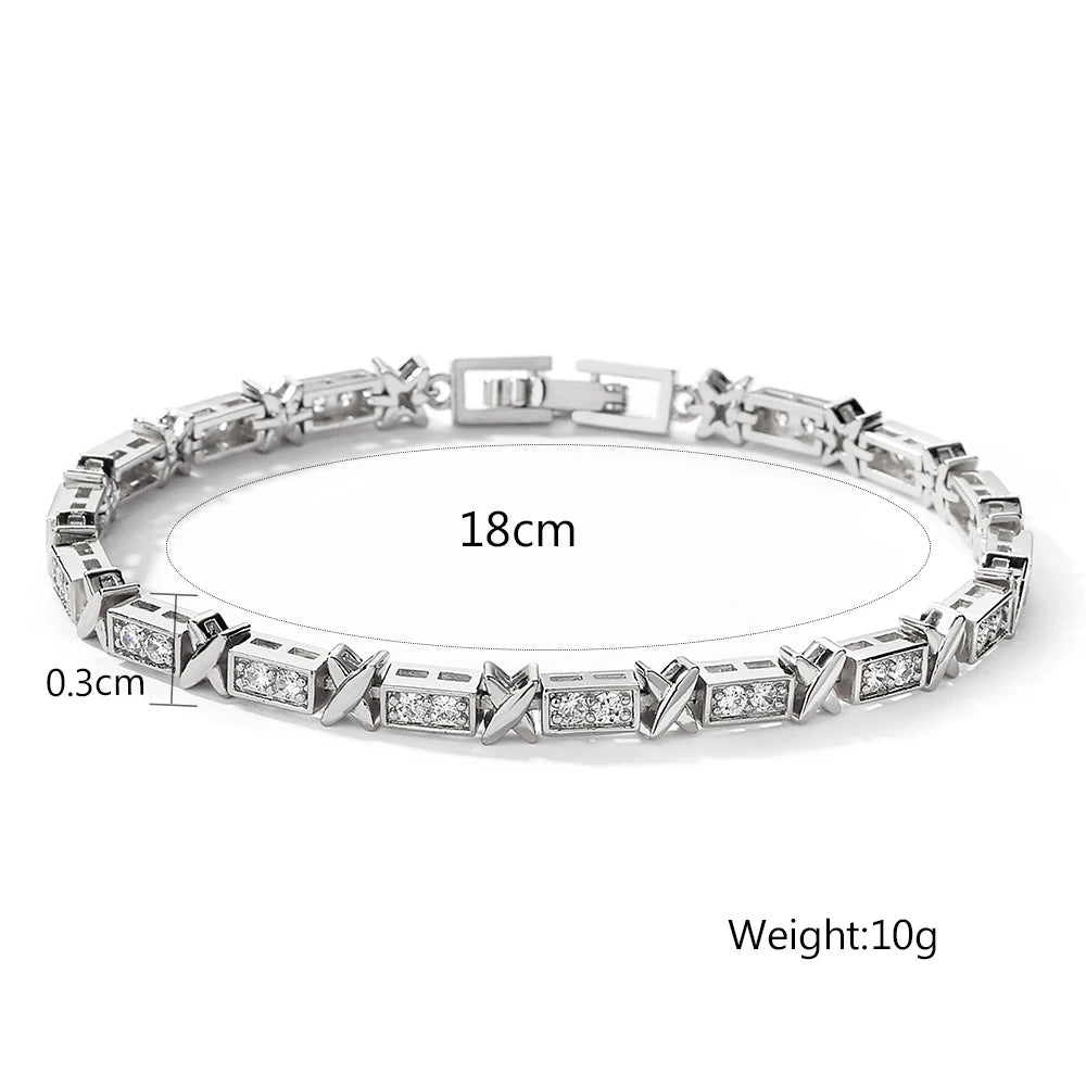 “Elegant X Cross Zirconia Charm Bracelet for Women and Men, Luxury Wedding Party Jewelry.”