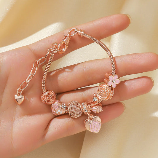 “Fashion rose and swan charm bracelet, elegant accessory for parties or daily wear.”
