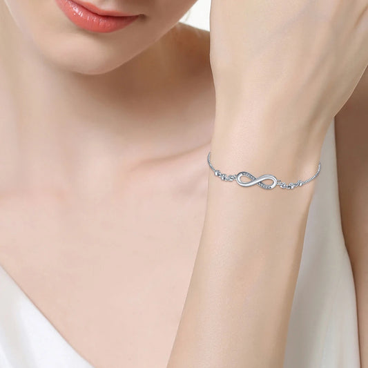 “Authentic 925 sterling silver infinity bracelet, adjustable design, elegant gift for women.”