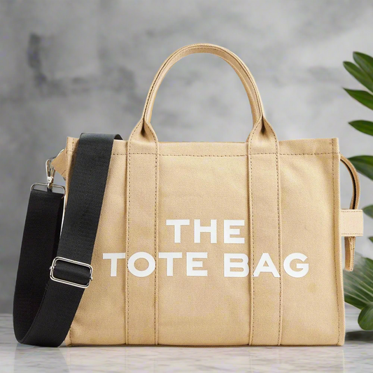 “Designer canvas tote bag, large capacity, adjustable shoulder strap, crossbody style.”