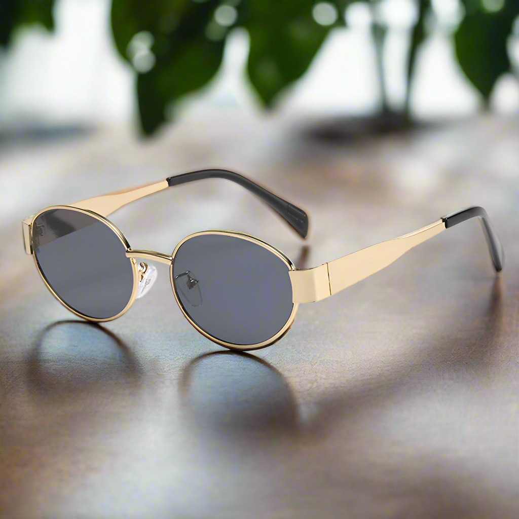 “Retro oval sunglasses, luxury metal frame, classic unisex design for driving.”