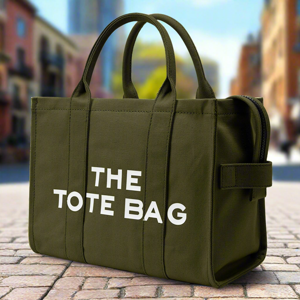 “Designer canvas tote bag, large capacity, adjustable shoulder strap, crossbody style.”