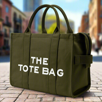 “Designer canvas tote bag, large capacity, adjustable shoulder strap, crossbody style.”