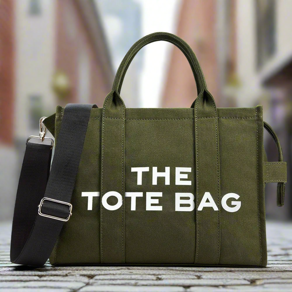 “Designer canvas tote bag, large capacity, adjustable shoulder strap, crossbody style.”