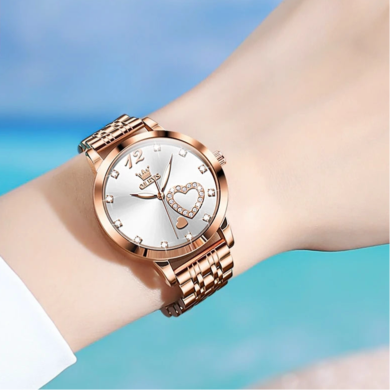 “Love Diamond Inlaid Steel Band Women’s Quartz Watch Elegant Fashion Timepiece.”