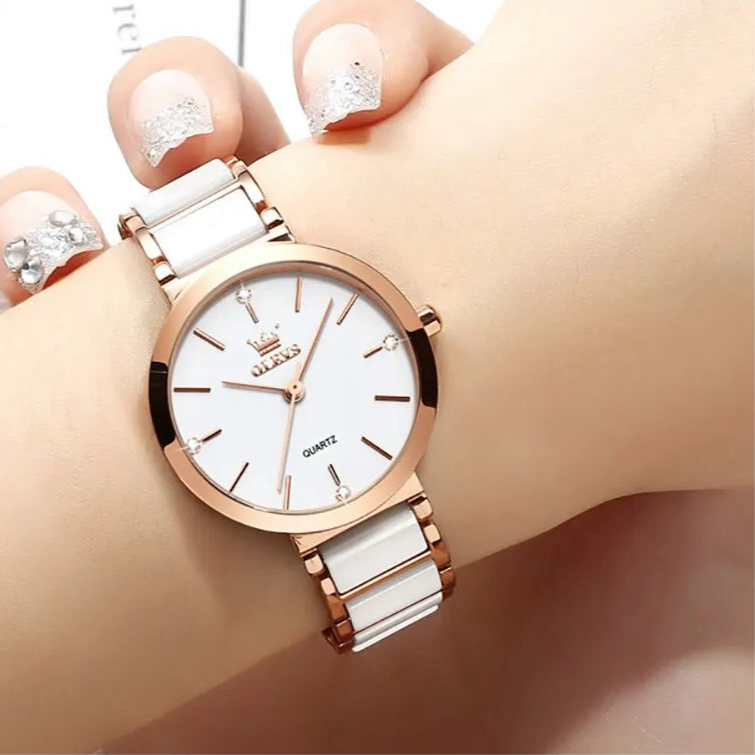 “Women’s Luxury Rose Gold Quartz Watch with Ceramic Strap Elegant Fashion Timepiece.”